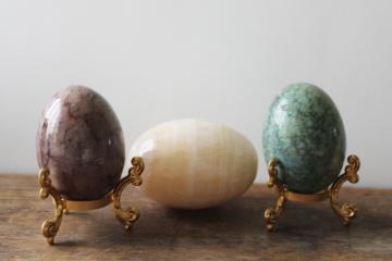 carved stone eggs w/ stands, dyed alabaster marble or onyx, natural brown, ivory, green 