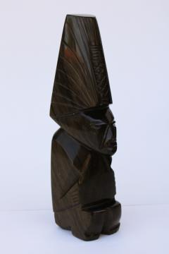 catalog photo of carved stone onyx or obsidian figure, Aztec Mayan tiki god handmade in Mexico 