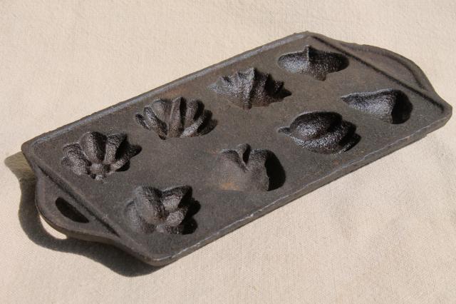 photo of cast iron maple sugar mold for making tiny leaves, acorns, pumpkins, fall fruit #1