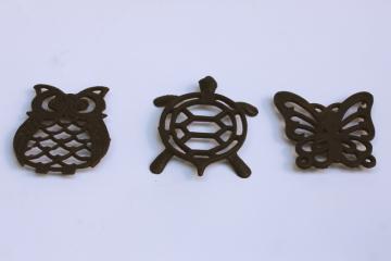 catalog photo of cast metal mini trivets, 70s vintage wall art owl, turtle, butterfly retro kitchen decor 