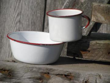 catalog photo of child's size vintage bowl and cup, primitive old red and white enamelware