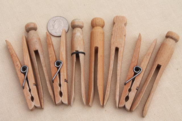 photo of child's size vintage wicker laundry basket full of old wood clothespins #5