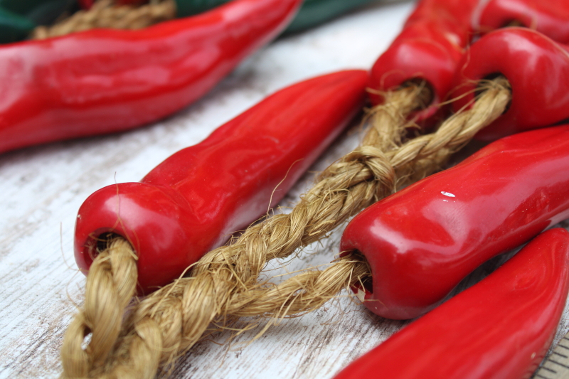 photo of chile pepper ristras handmade ceramic peppers, strings of green red chilies on rope #4