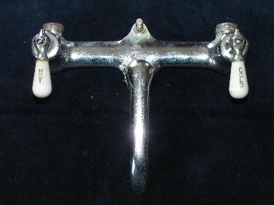 photo of chrome laundry sink faucet #1