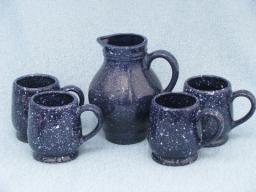 catalog photo of cobalt blue speckle spatterware pottery, faux graniteware dishes