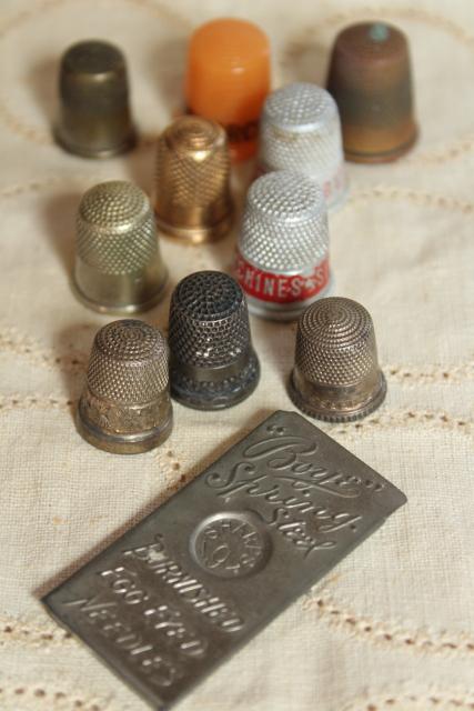 photo of collection of antique sewing tools - thimbles including sterling silver, vintage needle case #1