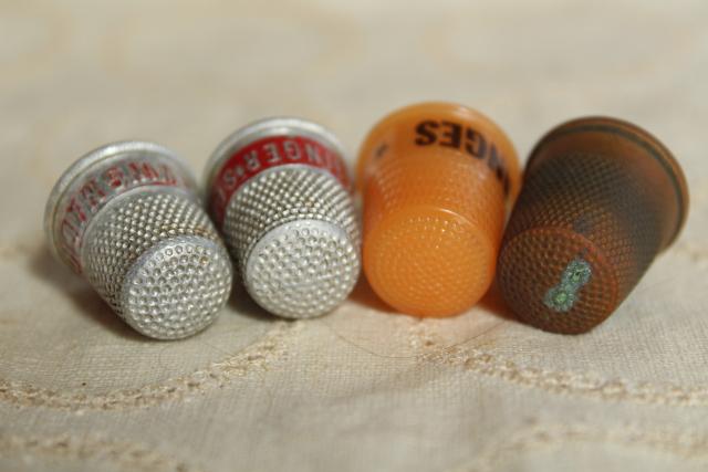 photo of collection of antique sewing tools - thimbles including sterling silver, vintage needle case #9