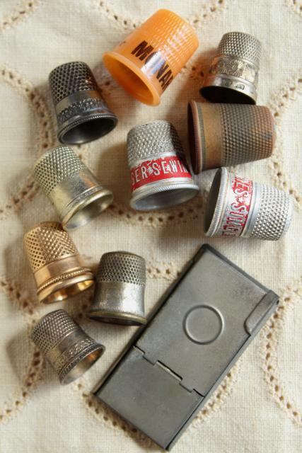 photo of collection of antique sewing tools - thimbles including sterling silver, vintage needle case #11