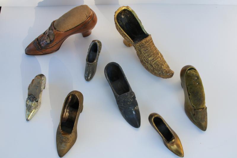 photo of collection of antique vintage cast metal shoes, ladies shoe pincushions #1