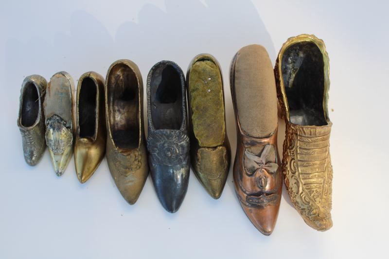 photo of collection of antique vintage cast metal shoes, ladies shoe pincushions #6