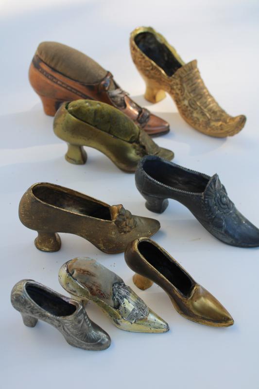 photo of collection of antique vintage cast metal shoes, ladies shoe pincushions #8