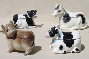 catalog photo of collection of cows, vintage ceramic jam pots cow herd, holsteins & little brown jersey