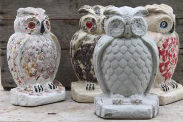 catalog photo of collection of old cement owls, owl doorstops or rustic garden ornaments 