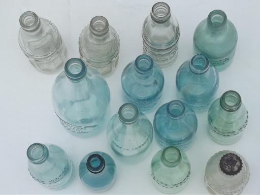 photo of collection of old soda & water bottles, heavy clear glass & aqua blue glass bottles #6