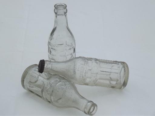 photo of collection of old soda & water bottles, heavy clear glass & aqua blue glass bottles #13