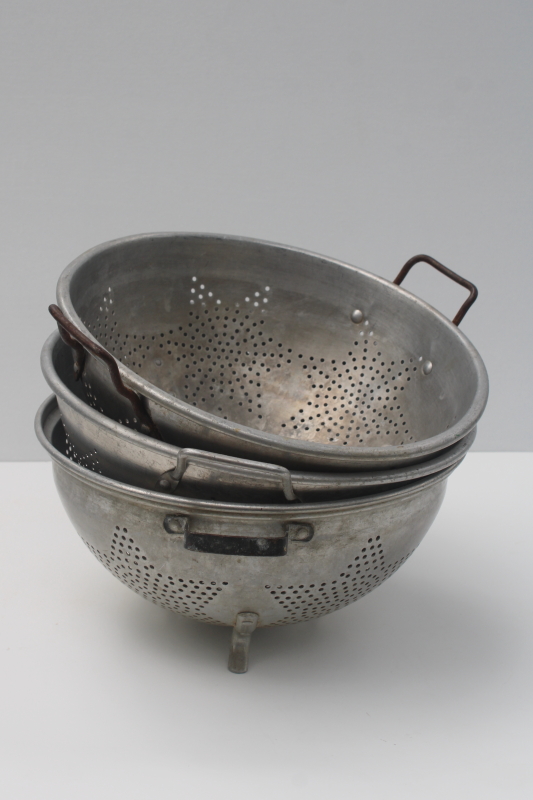 photo of collection of vintage star pattern aluminum colanders, rustic old strainer bowls  #1