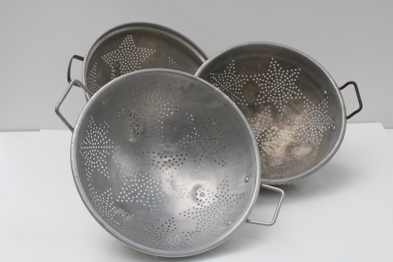 photo of collection of vintage star pattern aluminum colanders, rustic old strainer bowls  #2