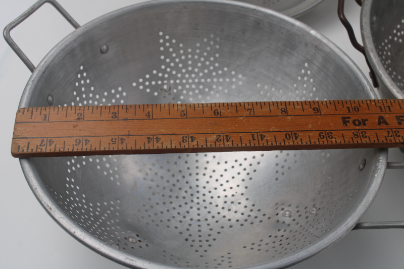 photo of collection of vintage star pattern aluminum colanders, rustic old strainer bowls  #3