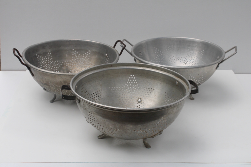 photo of collection of vintage star pattern aluminum colanders, rustic old strainer bowls  #5