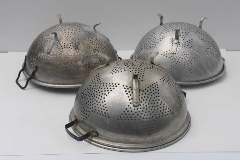 photo of collection of vintage star pattern aluminum colanders, rustic old strainer bowls  #9