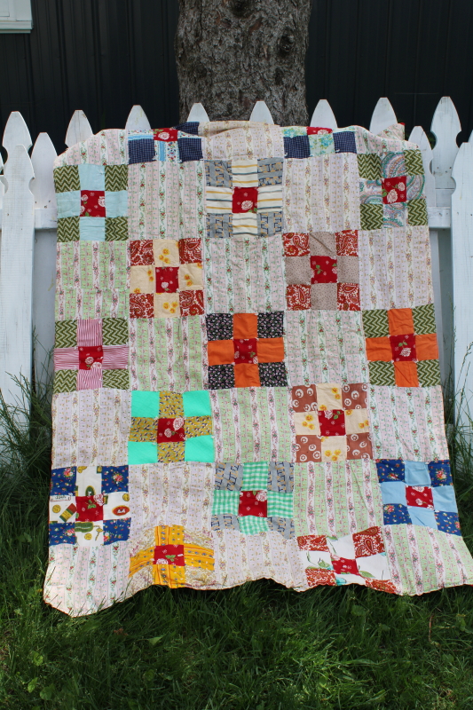 photo of colorful vintage patchwork quilt, 60s 70s retro print fabric blocks, boho style #1