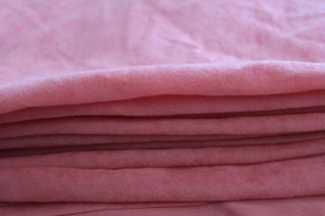 coral pink blush color poly velvet, light synthetic fabric w/ flocked type texture