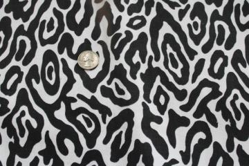 catalog photo of cotton canvas fabric, retro black & white spotted leopard animal print 