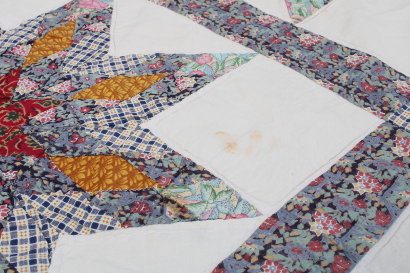 photo of cotton patchwork quilt eight pointed stars dark blue, barn red, yellow gold prints on white  #6