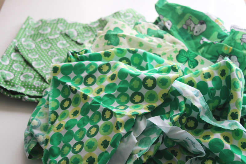 photo of cotton scrap fabric lot St Patricks day prints, all green lucky clover shamrocks & Snoopy #1