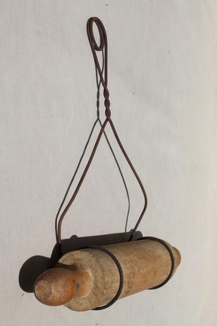 photo of country primitive antique wood rolling pin in rustic old wire wall holder rack #3