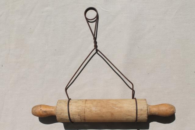 photo of country primitive antique wood rolling pin in rustic old wire wall holder rack #4