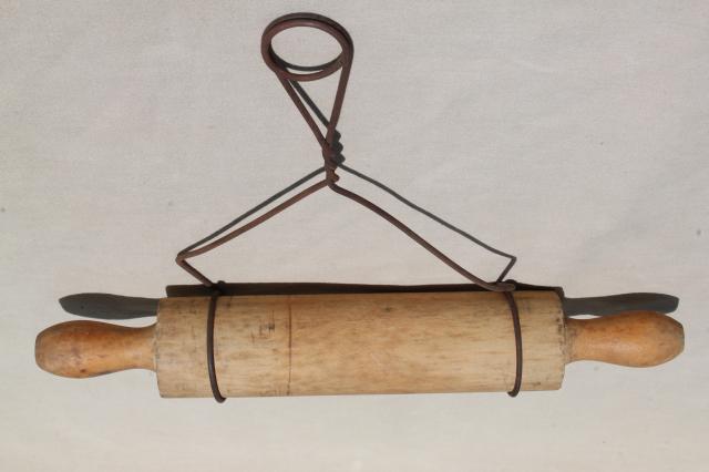 photo of country primitive antique wood rolling pin in rustic old wire wall holder rack #5