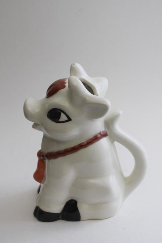 photo of cow cream pitcher, hand painted ceramic creamer, sitting up cow w/ brown & white spots #1