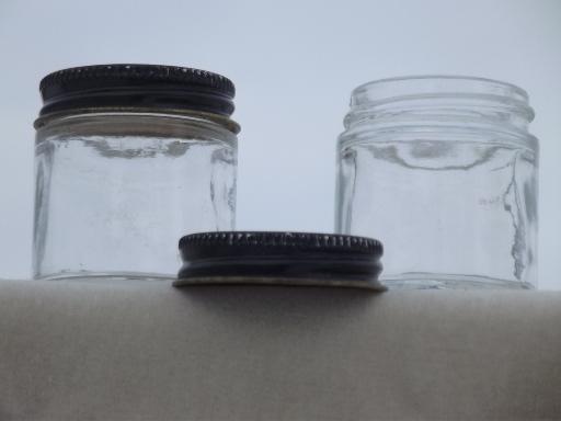 photo of craft supplies storage or spice jars, old glass bottles with metal screw lids #2