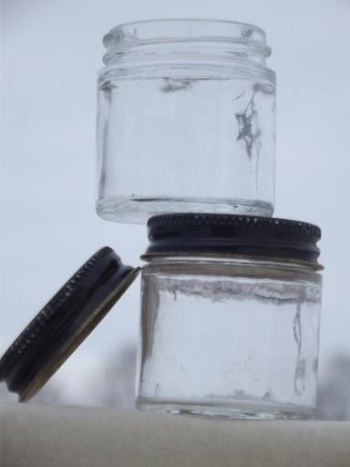 photo of craft supplies storage or spice jars, old glass bottles with metal screw lids #3