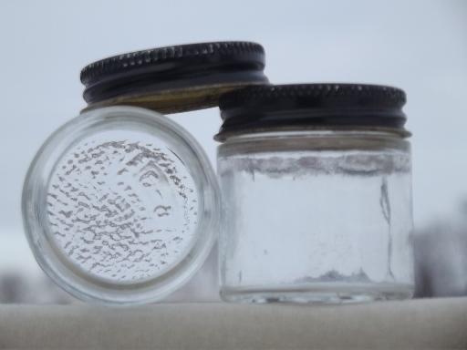 photo of craft supplies storage or spice jars, old glass bottles with metal screw lids #4