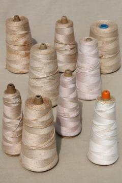 catalog photo of creamy white antique colors primitive grubby old spools of vintage cotton cord thread