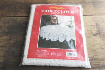 catalog photo of crochet lace look white plastic vinyl tablecloth sealed in package, never used 