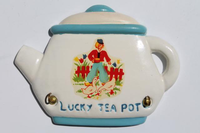 photo of cute Lucky Teapot vintage chalkware wall plaque potholder rack & crochet potholders #2