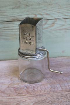 catalog photo of depression era vintage hand crank metal nut meat grinder w/ Hazel Atlas glass jar