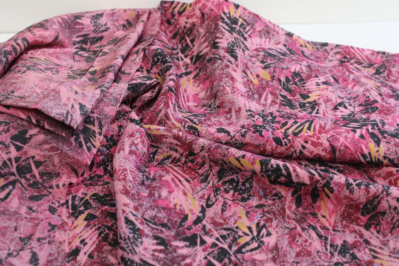 photo of disco vintage silky polyester fabric, abstract print in plum pink, black, yellow gold #1