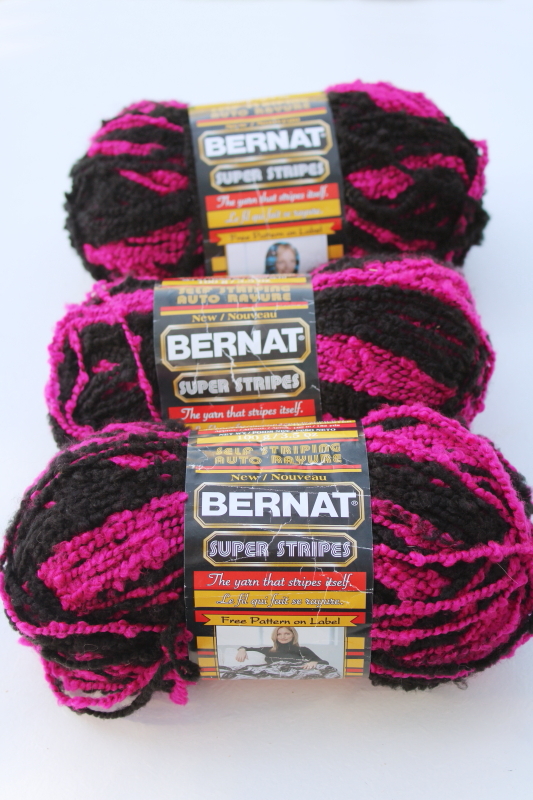 photo of discontinued Bernat Super Stripes magenta pink black self striping yarn soft boucle texture #1