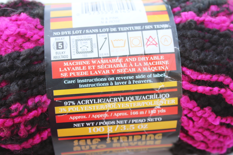 photo of discontinued Bernat Super Stripes magenta pink black self striping yarn soft boucle texture #3