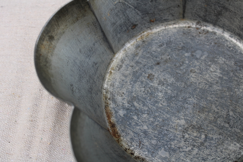 photo of early 1900s antique tin food mold or baking pan, fluted bowl weathered zinc metal color #3