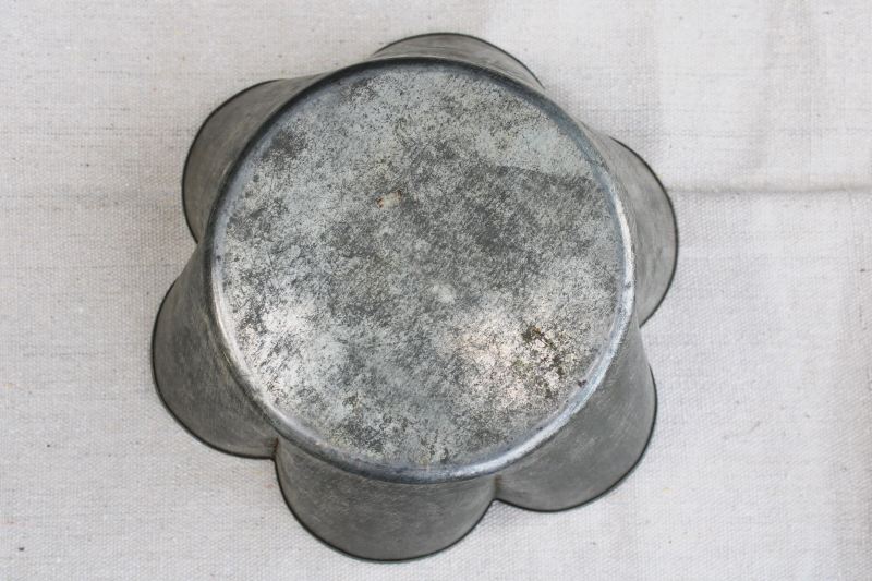 photo of early 1900s antique tin food mold or baking pan, fluted bowl weathered zinc metal color #5