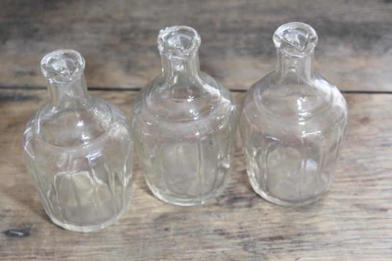 photo of early 1900s vintage maple syrup bottles, jug shape pressed glass pitchers #2