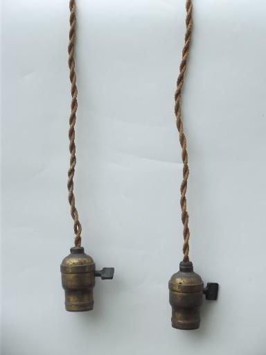 photo of early electric pendant light ceiling fixtures, old cord and antique brass sockets #1