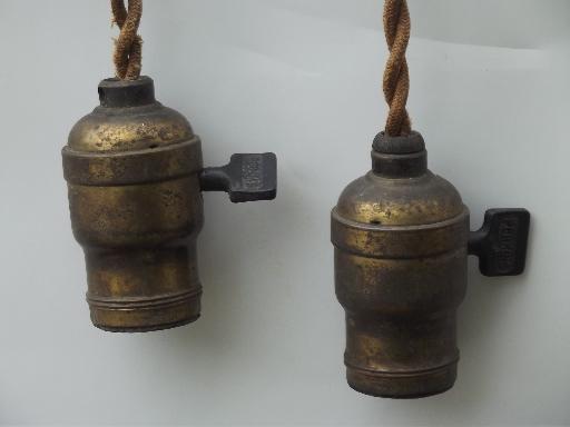 photo of early electric pendant light ceiling fixtures, old cord and antique brass sockets #2