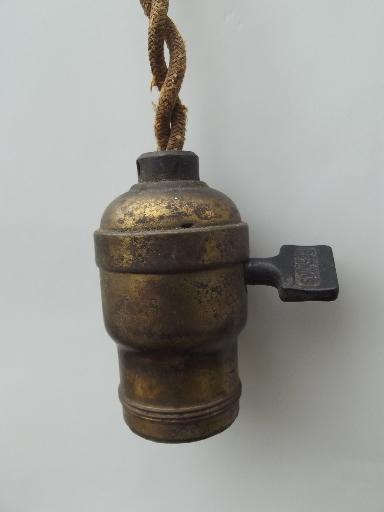 photo of early electric pendant light ceiling fixtures, old cord and antique brass sockets #3