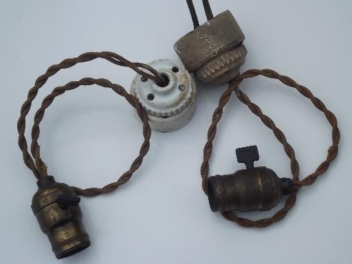 photo of early electric pendant light ceiling fixtures, old cord and antique brass sockets #5